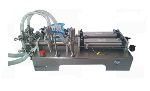 16010-14167_image_0.jpg Mahalaxmi Machines 5 - 20 bottle/min Pneumatic Piston Based Semi Automatic Filling Machine